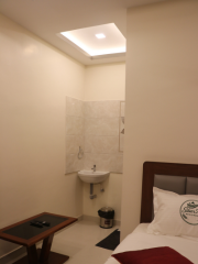 Deluxe Room Seating Area and Interior Decor